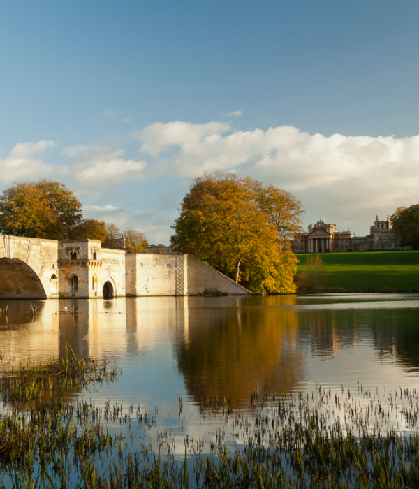 The Grand Bridge in the grounds of Blenheim Palace, Woodstock. The palace in the background.